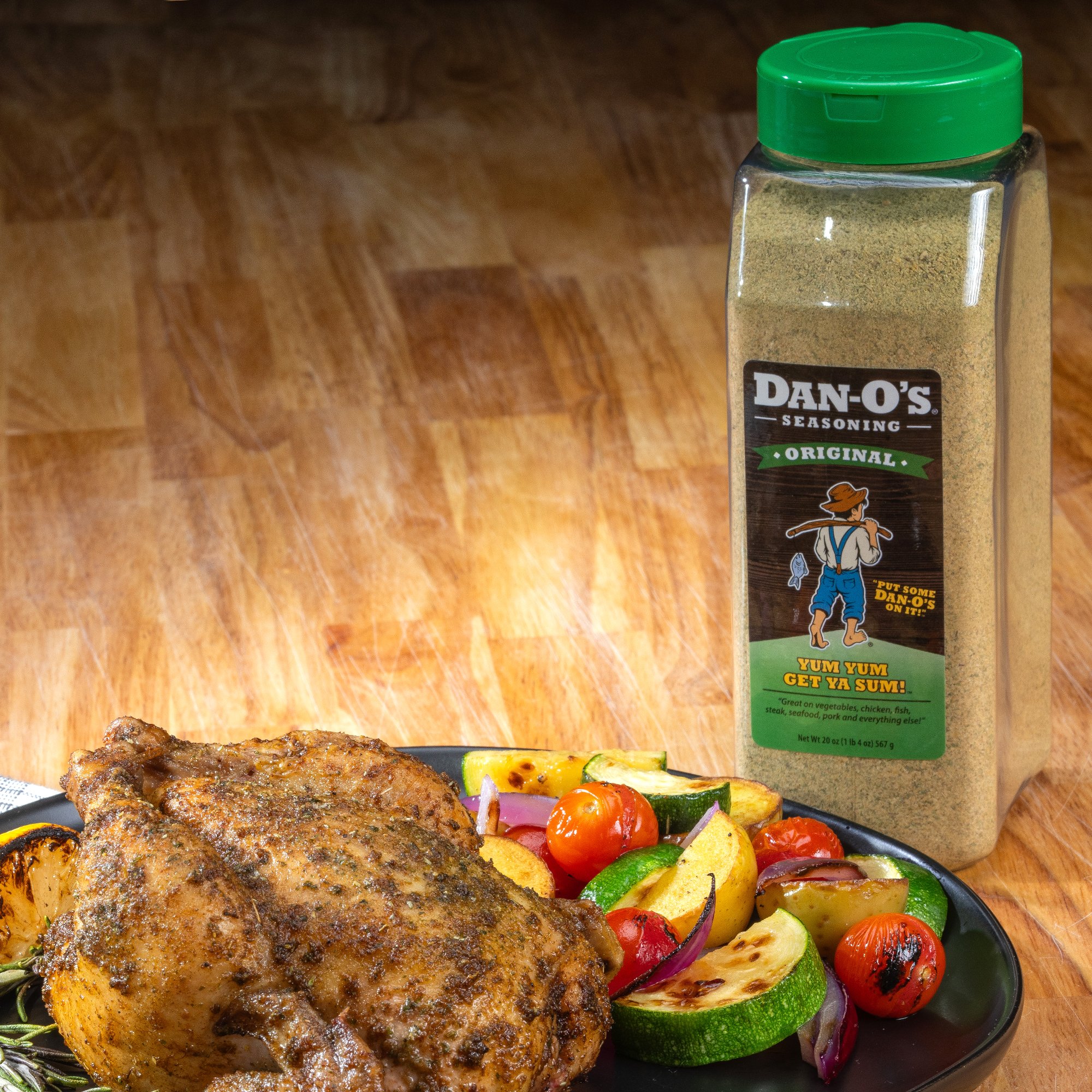 Delicious food featuring a generous sprinkle from a large bottle of Dan-O's Original Seasoning.