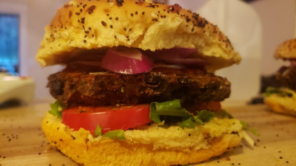 image of dressed homemade black bean burger