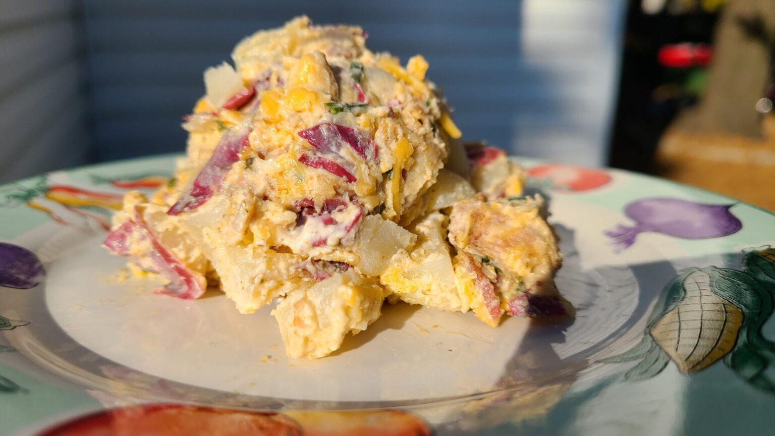 Image of loaded potato salad from recipe on plate