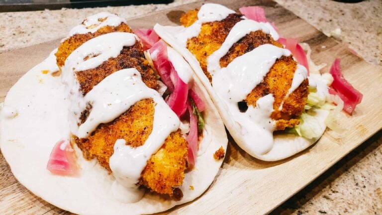 Nashville Hot Chicken tender tacos on cutting board