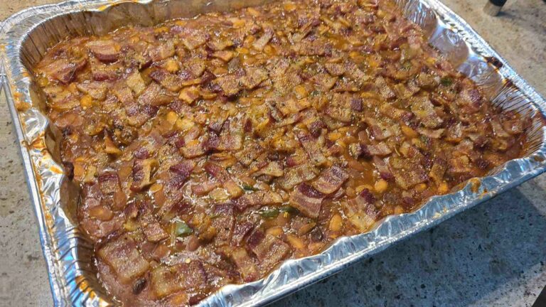 Cooked baked beans in aluminum pan