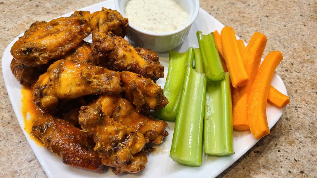 Baked buffalo wings, ready to eat