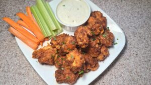 boneless chicken wing, celery, and bleu cheese dip
